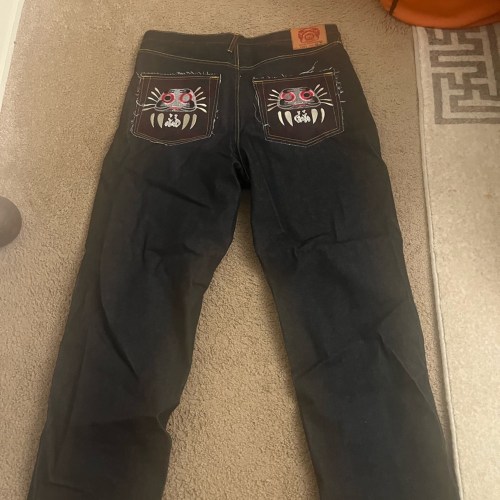 Size 40 used red monkey jeans